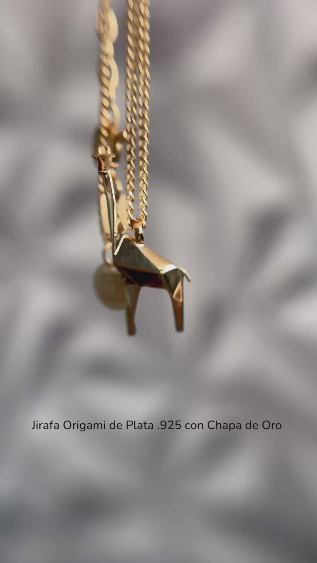 Video Jirafa Origami de Plata con Chapa de Oro