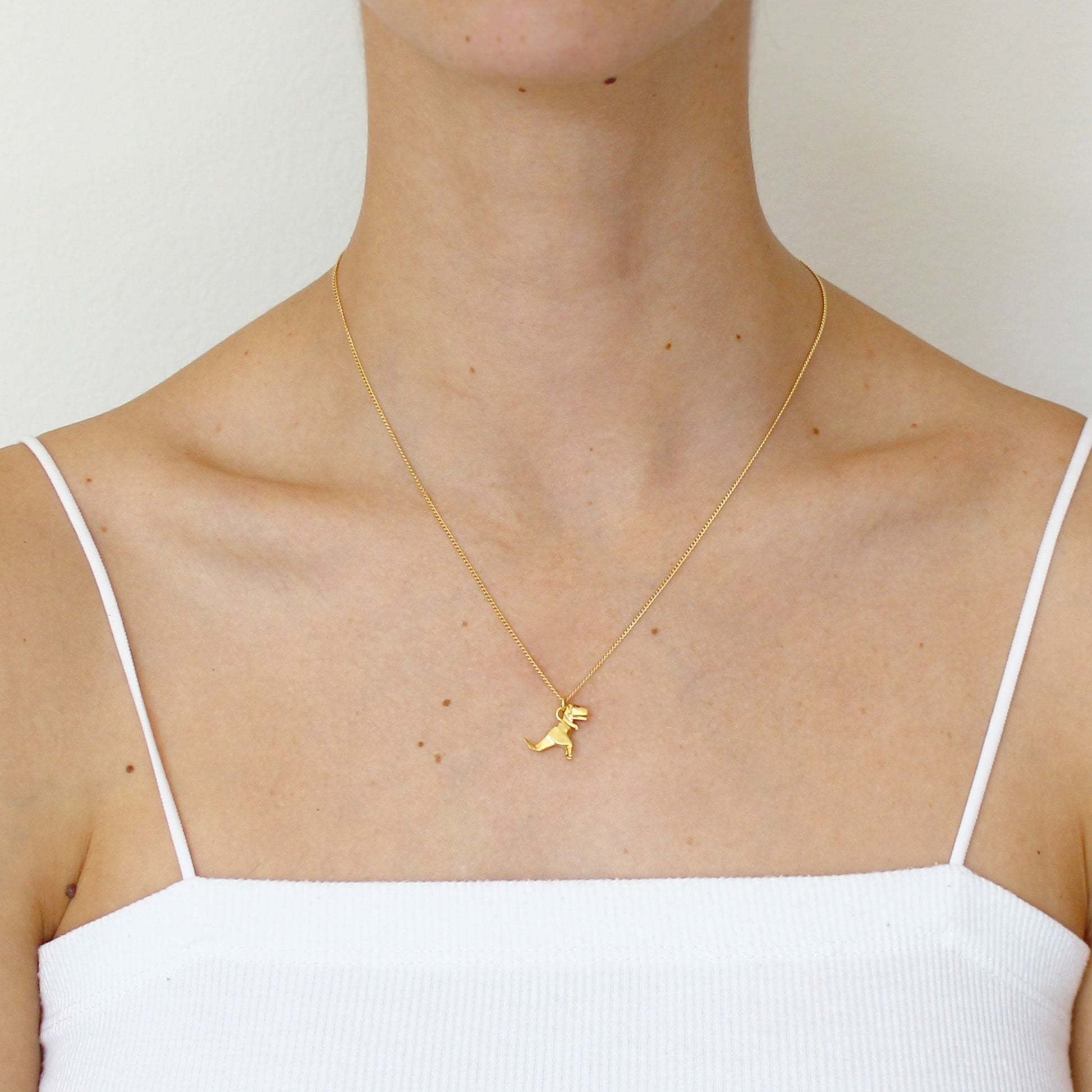 MODELO USA DIJE T- REX ORIGAMI DE PLATA .925/CHAPA DE ORO AMARILLO CON CADENA.